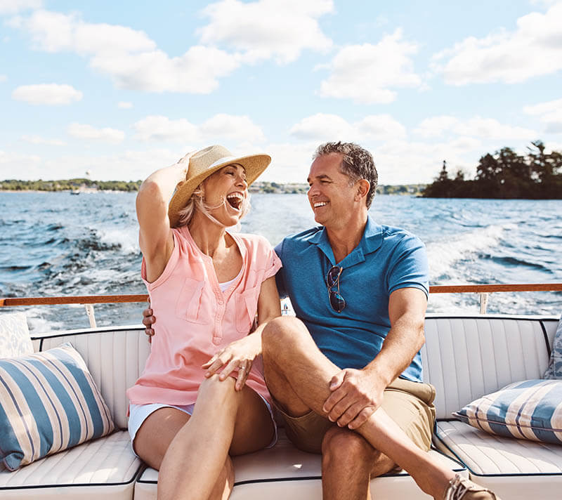 Couple laughing on a boat