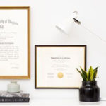 Diplomas framed on a wall